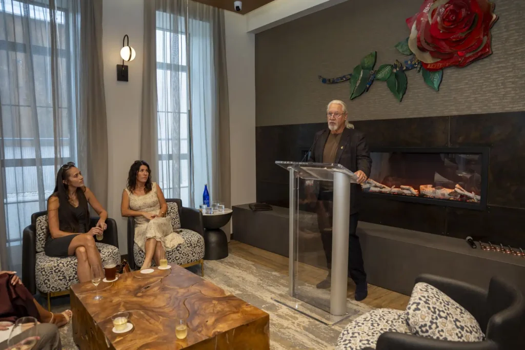 John Wheeler speaking at Hotel Rose Grand Opening